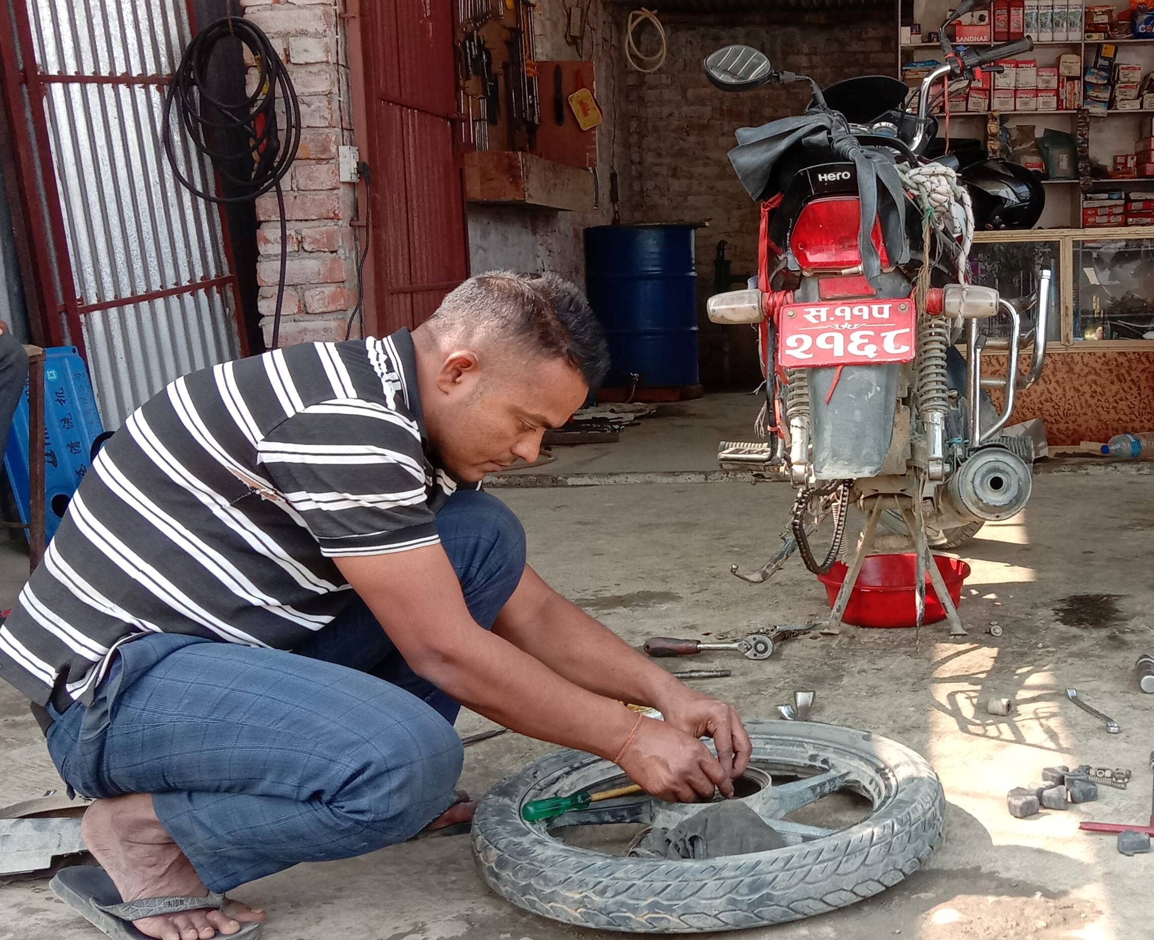 From sweet shop and migrant laborer to employing others at a Motorcycle workshop